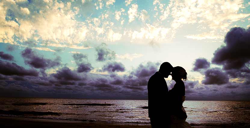 Honeymoon Island Bride and Groom Embrace on Beach 2