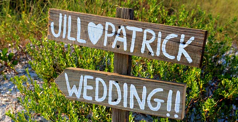 Honeymoon Island Wedding Sign on Beach