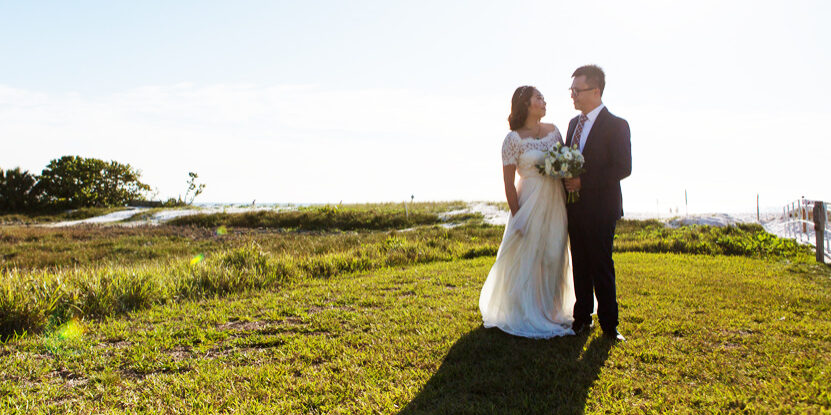Bride and Groom on Grass overlooking St.Joseph Sound